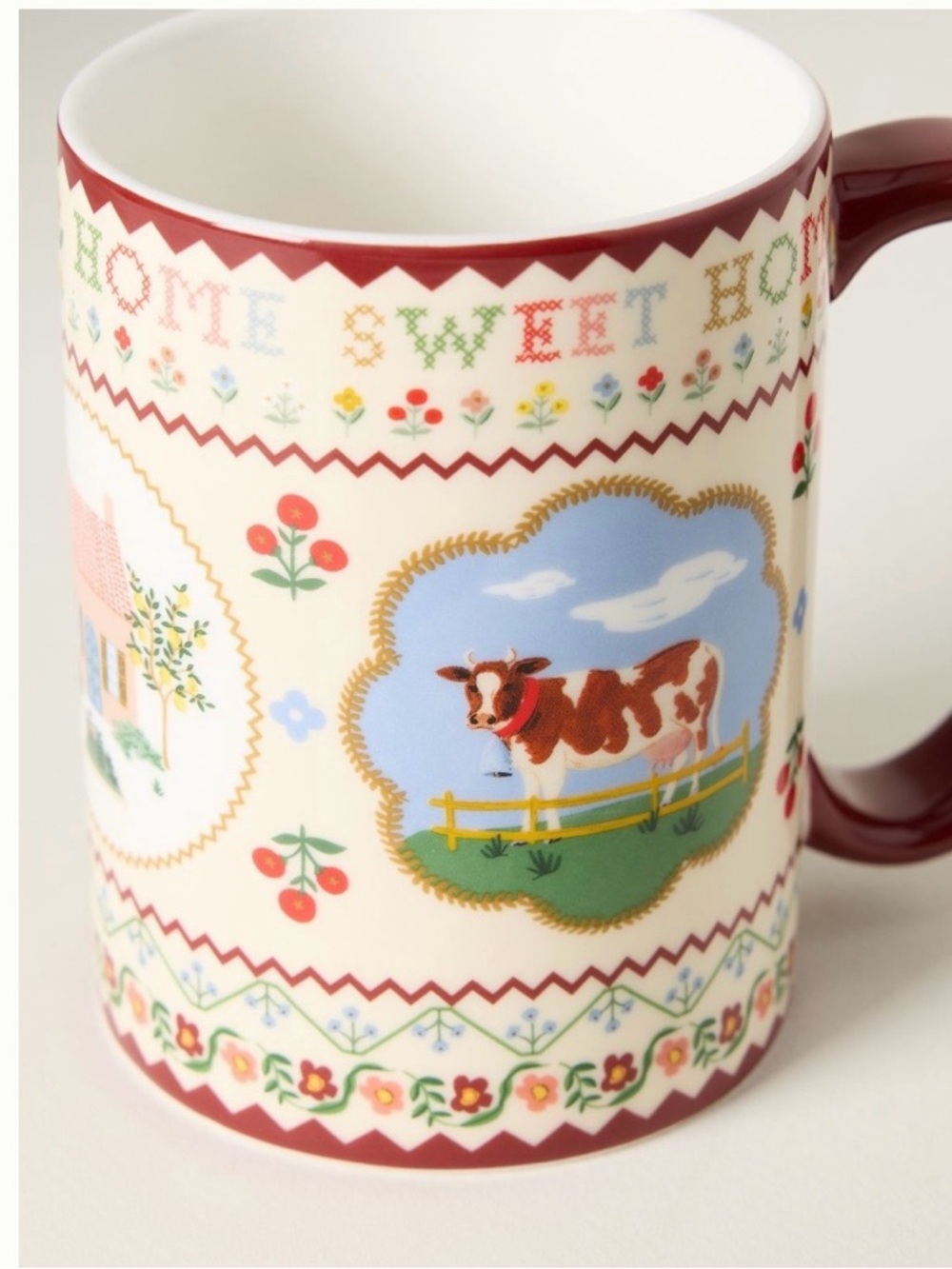 Rifle Paper Co. Cream Mug with Red Handle and Floral Cow Design - Picture 4 of 6